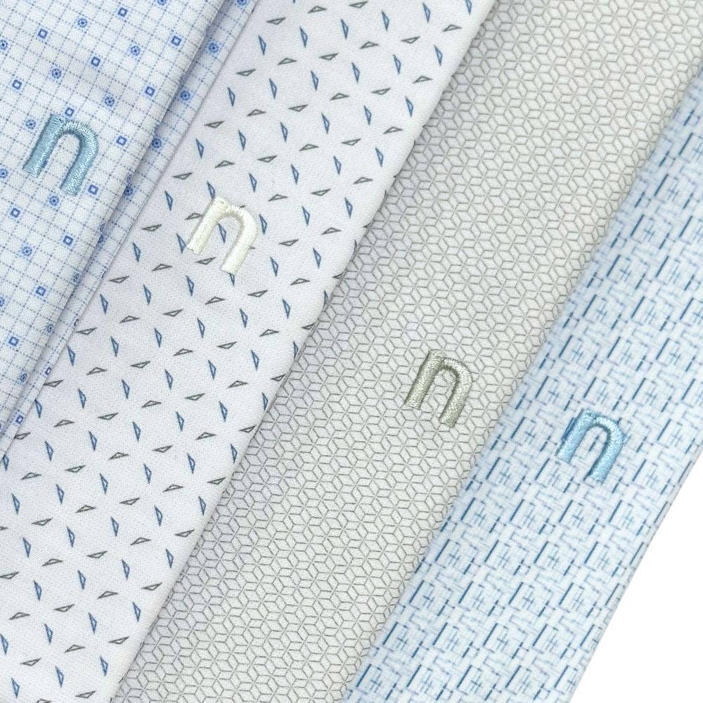 ÁO POLO NAM NOVELTY REGULAR FIT TENCEL HOA VĂN XANH NATMINMT3R260897N