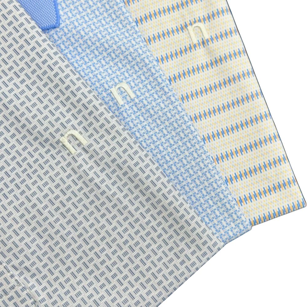 ÁO POLO NAM NOVELTY REGULAR FIT SPUN POLY HOA VĂN XANH NATMINMPLR261021N